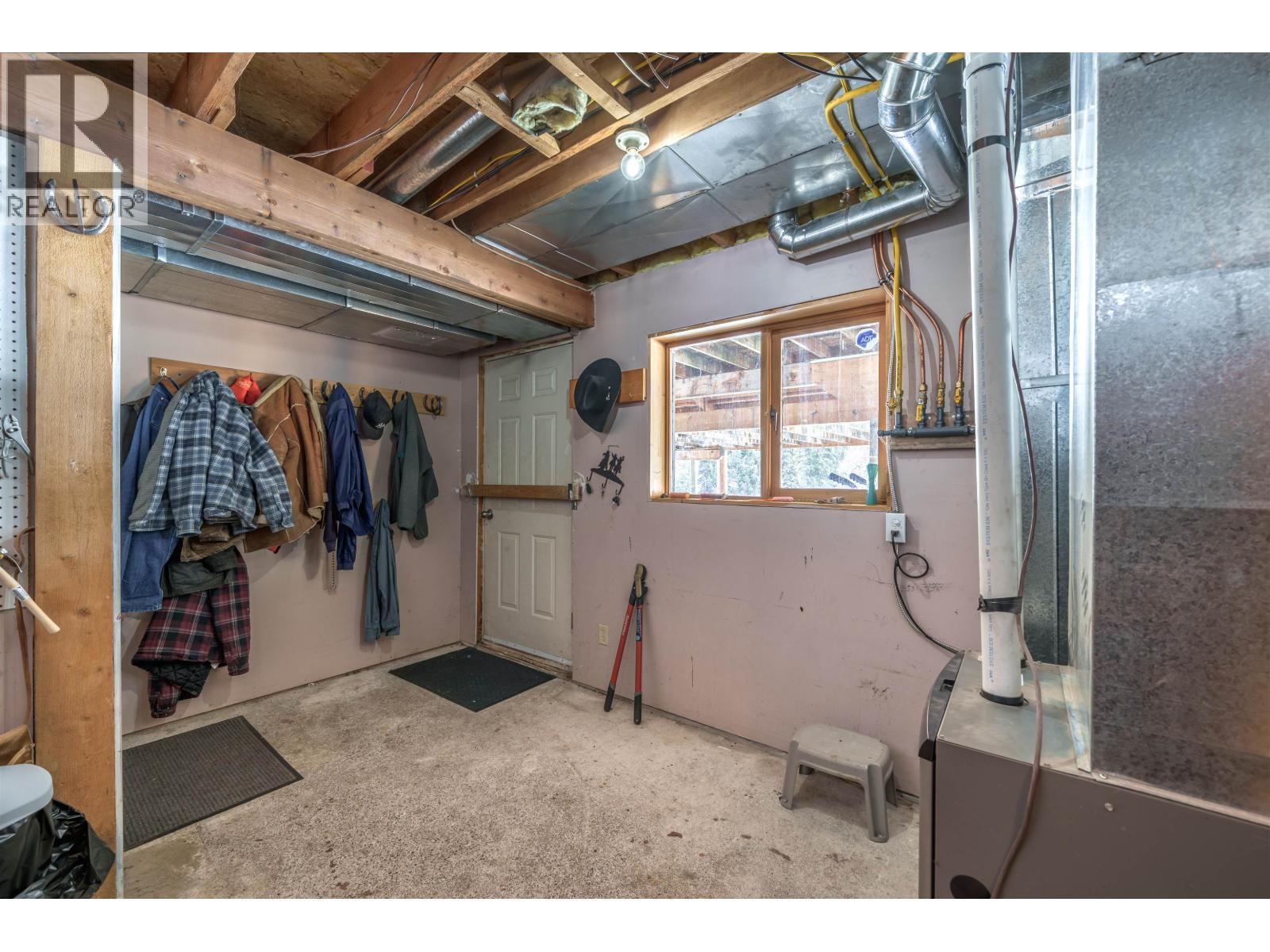 7540 Mccarthy Road, Bridge Lake, BC - Indoor Photo Showing Basement