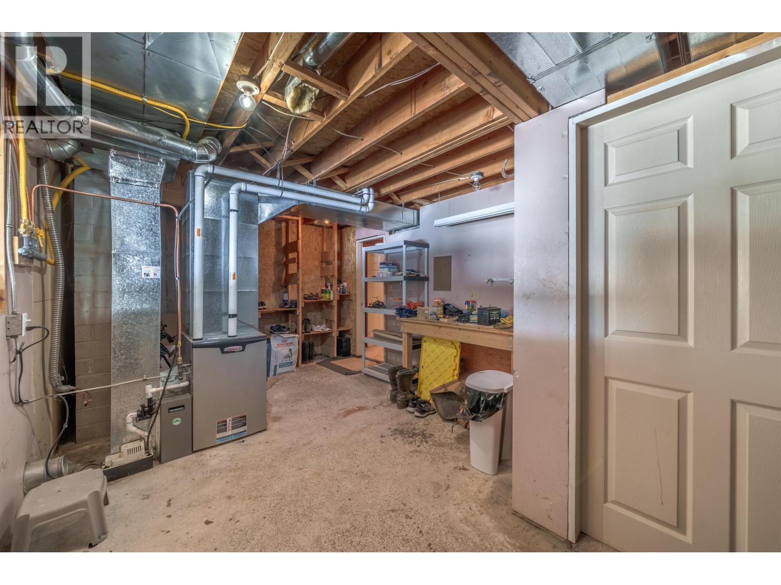 7540 Mccarthy Road, Bridge Lake, BC - Indoor Photo Showing Basement