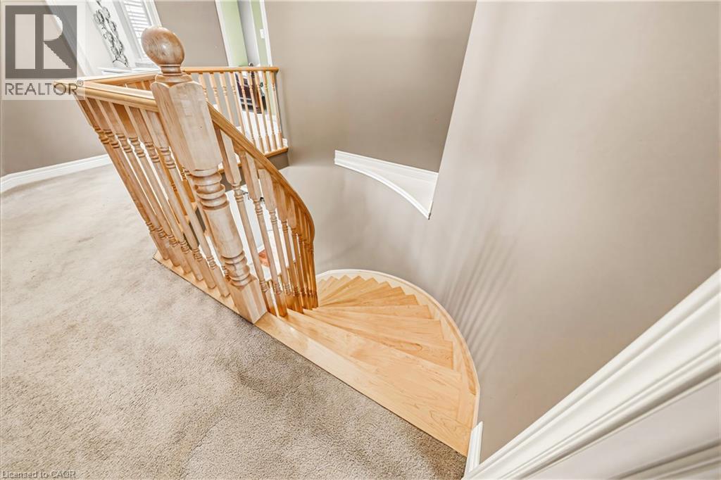 Stairs featuring carpet and baseboards - 120 Valiant Circle, Hamilton, ON - Indoor Photo Showing Other Room