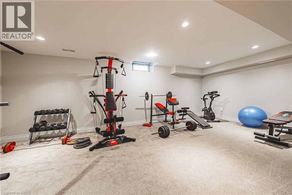 Workout area featuring carpet floors and recessed lighting - 120 Valiant Circle, Hamilton, ON - Indoor Photo Showing Gym Room