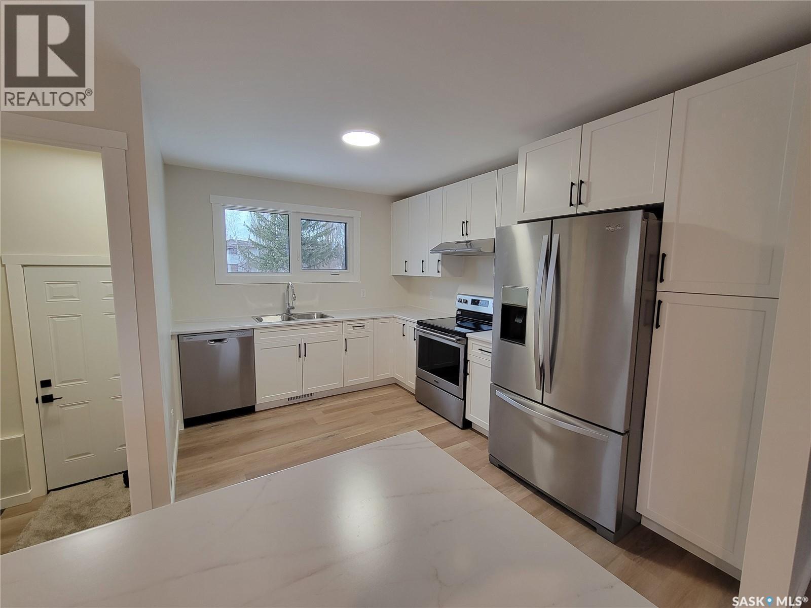 357 5Th Avenue W, Unity, SK - Indoor Photo Showing Kitchen With Double Sink