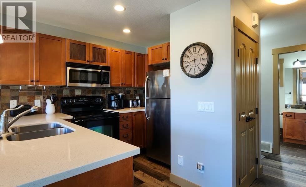 6844 Madrid Way Unit# 321, Fintry, BC - Indoor Photo Showing Kitchen With Double Sink