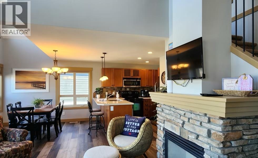 6844 Madrid Way Unit# 321, Fintry, BC - Indoor With Fireplace