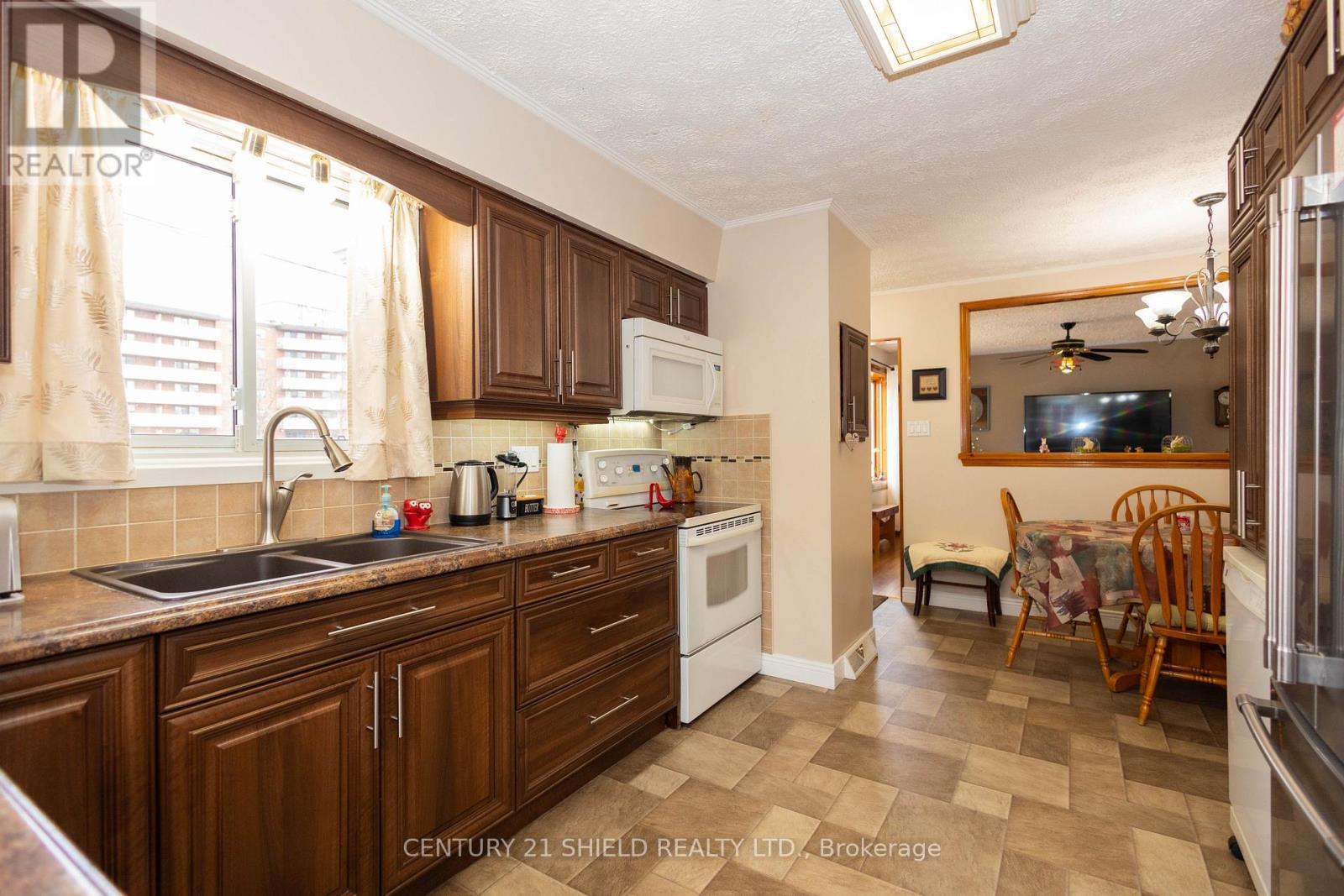 1443 1St Street E, Cornwall, ON - Indoor Photo Showing Kitchen With Double Sink