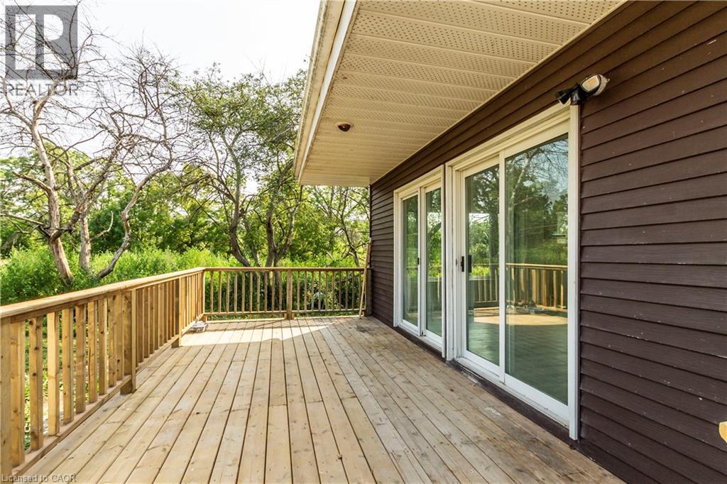 View of wooden terrace - 1411 E 56 Highway, Glanbrook, ON - Outdoor With Deck Patio Veranda With Exterior