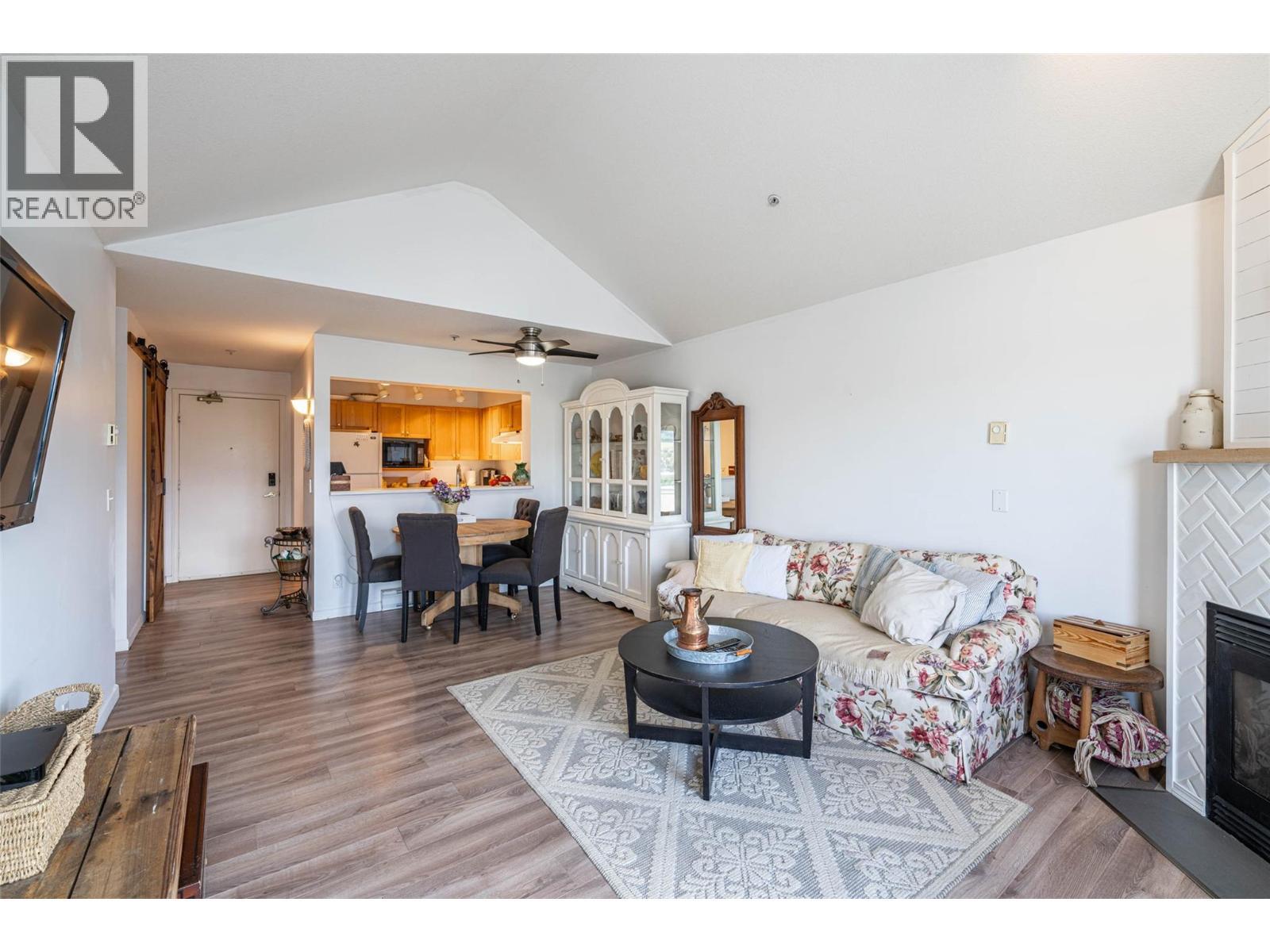 3320 Centennial Drive Unit# 403, Vernon, BC - Indoor Photo Showing Living Room With Fireplace