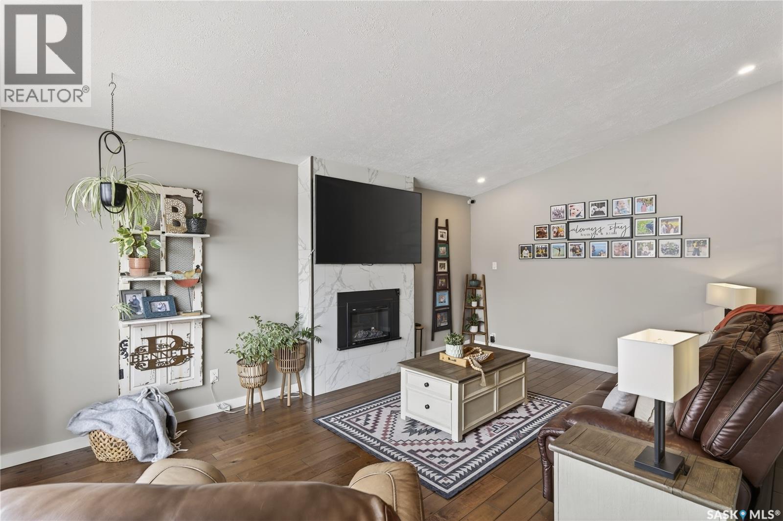 35 King Crescent, Humboldt, SK - Indoor Photo Showing Living Room With Fireplace