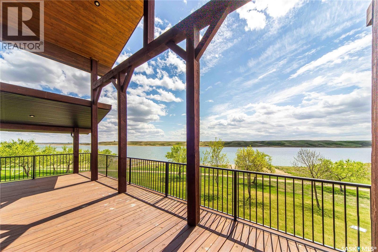 35 Grace Bay, Diefenbaker Lake, SK - Outdoor With Body Of Water With Deck Patio Veranda With View With Exterior