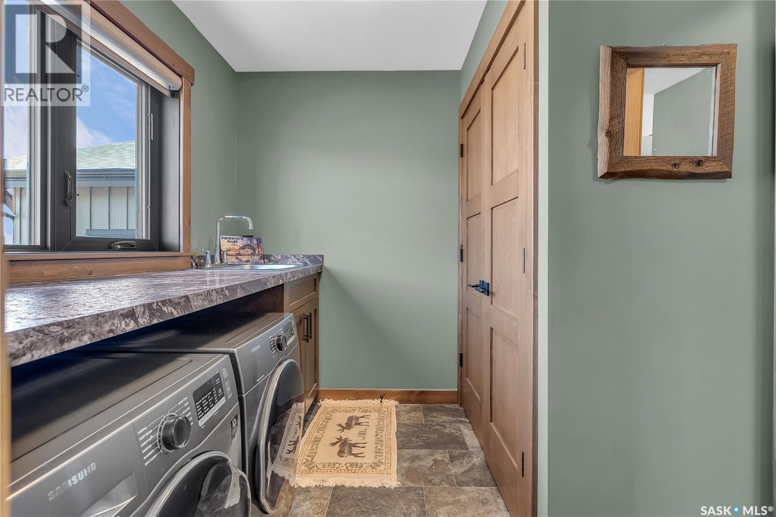35 Grace Bay, Diefenbaker Lake, SK - Indoor Photo Showing Laundry Room