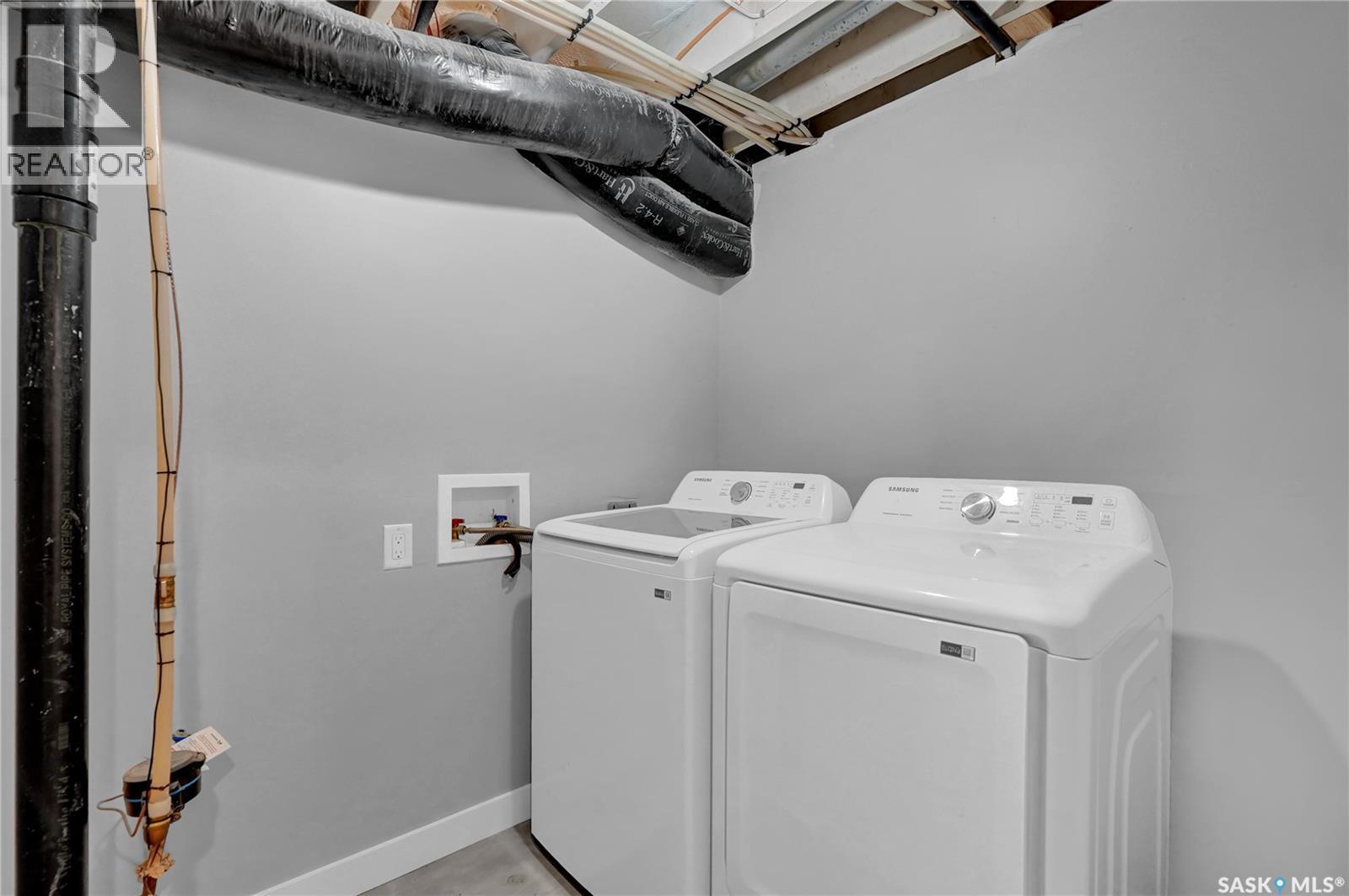 3347 Coughlin Bay E, Regina, SK - Indoor Photo Showing Laundry Room