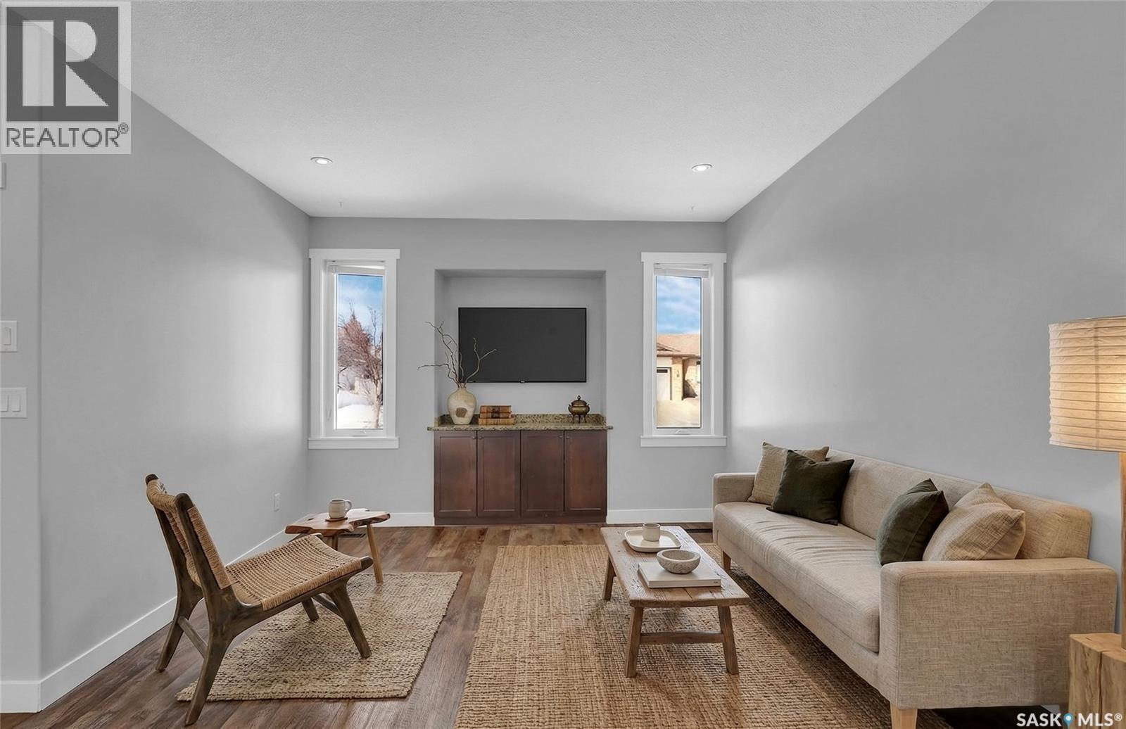 3347 Coughlin Bay E, Regina, SK - Indoor Photo Showing Living Room