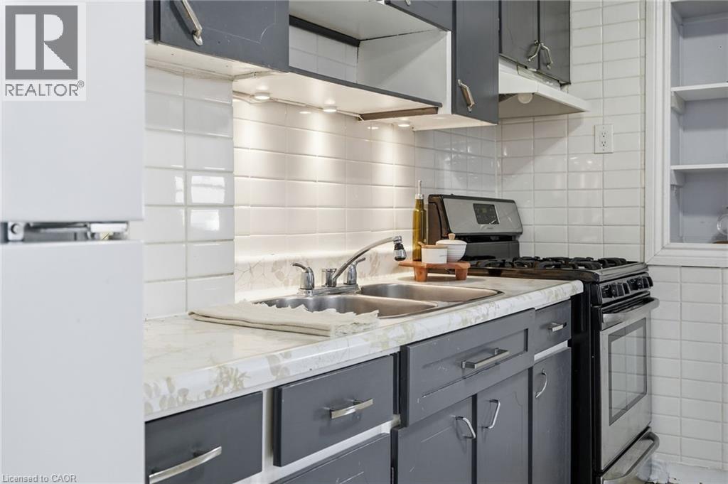 79 Murray Street E, Hamilton, ON - Indoor Photo Showing Kitchen With Double Sink