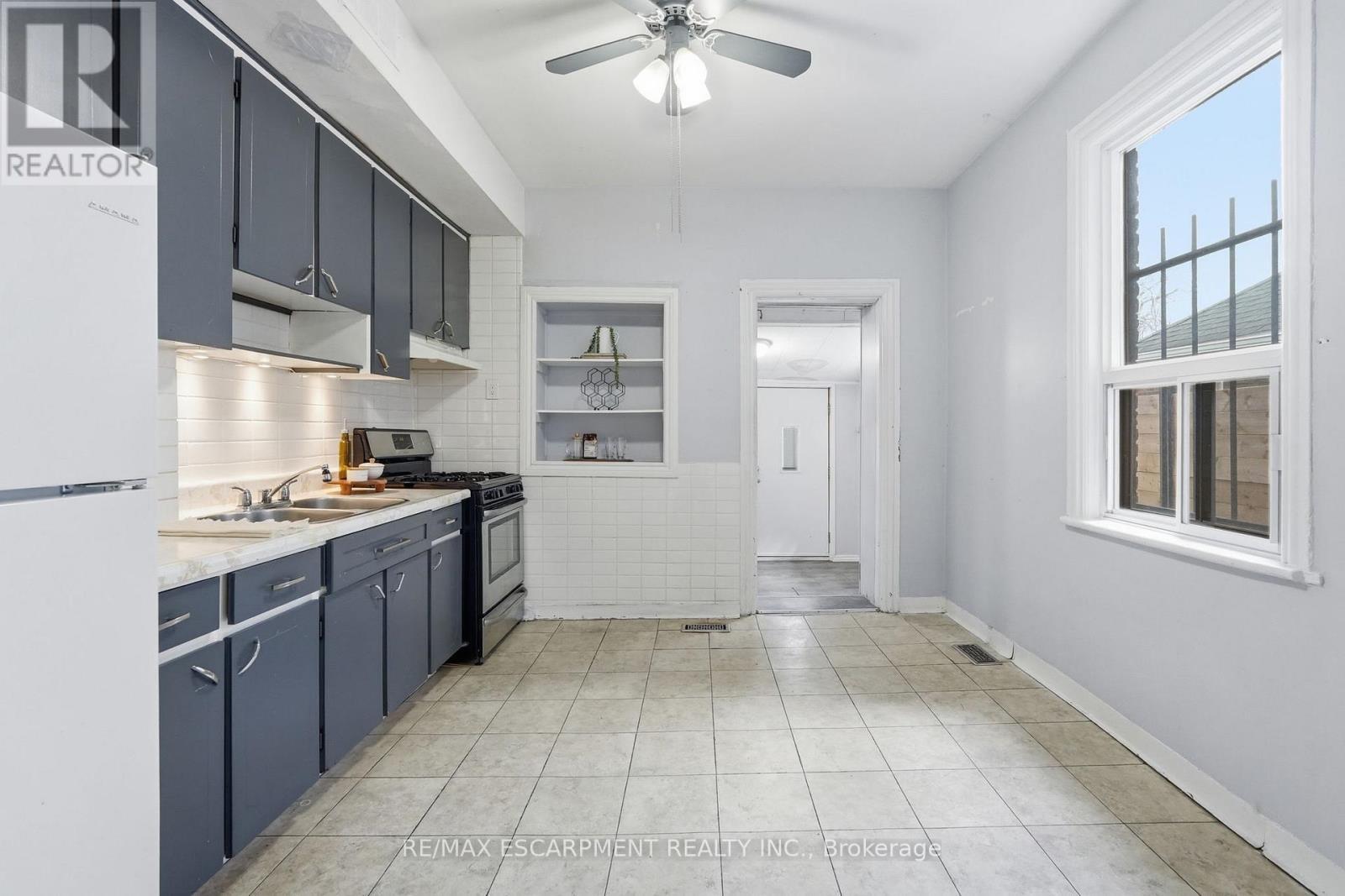 79 Murray Street E, Hamilton, ON - Indoor Photo Showing Kitchen With Double Sink