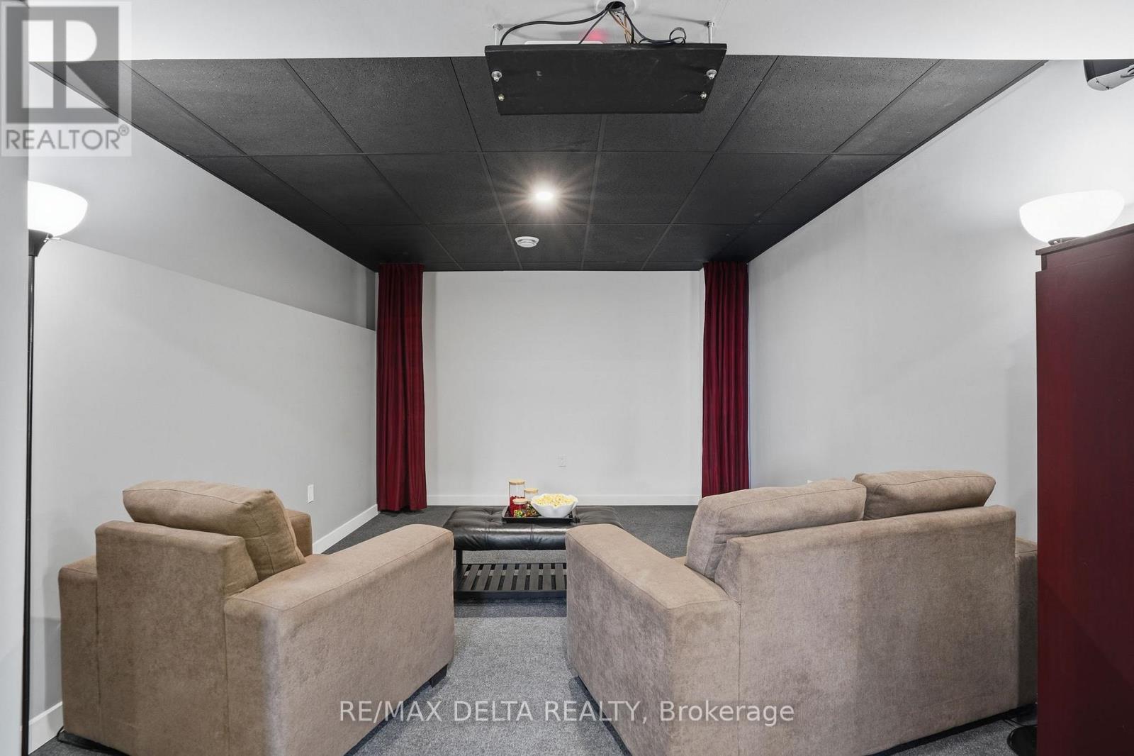 Home theatre in basement - 100 Pendleton Street, Champlain, ON - Indoor Photo Showing Other Room