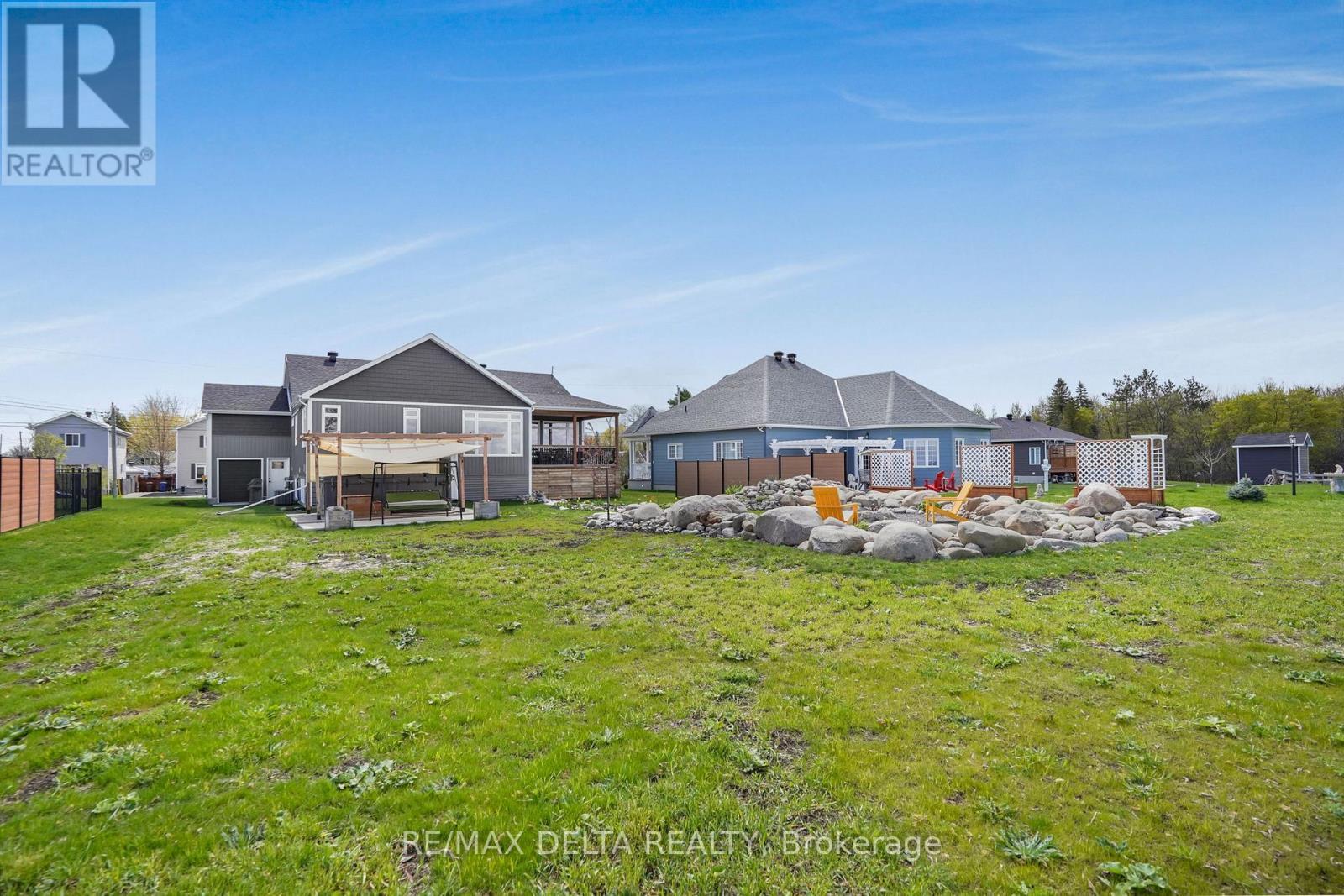 Back yard: no rear neighbours. - 100 Pendleton Street, Champlain, ON - Outdoor With Deck Patio Veranda