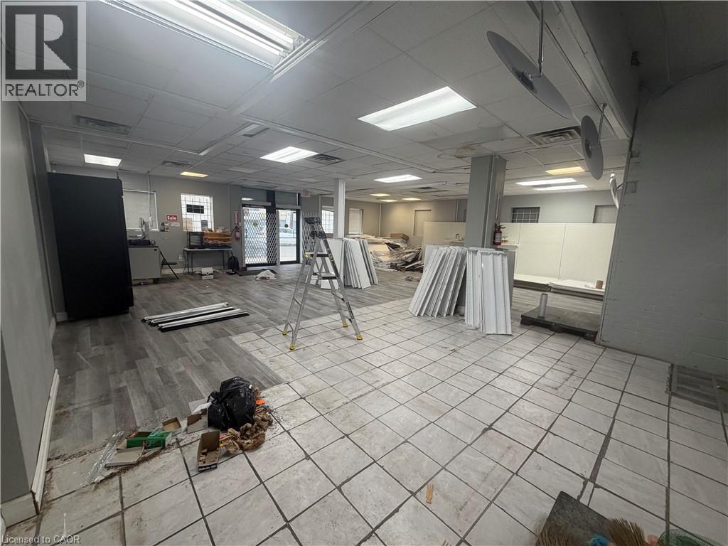 Miscellaneous room with a drop ceiling - 10 Sanford Avenue N, Hamilton, ON