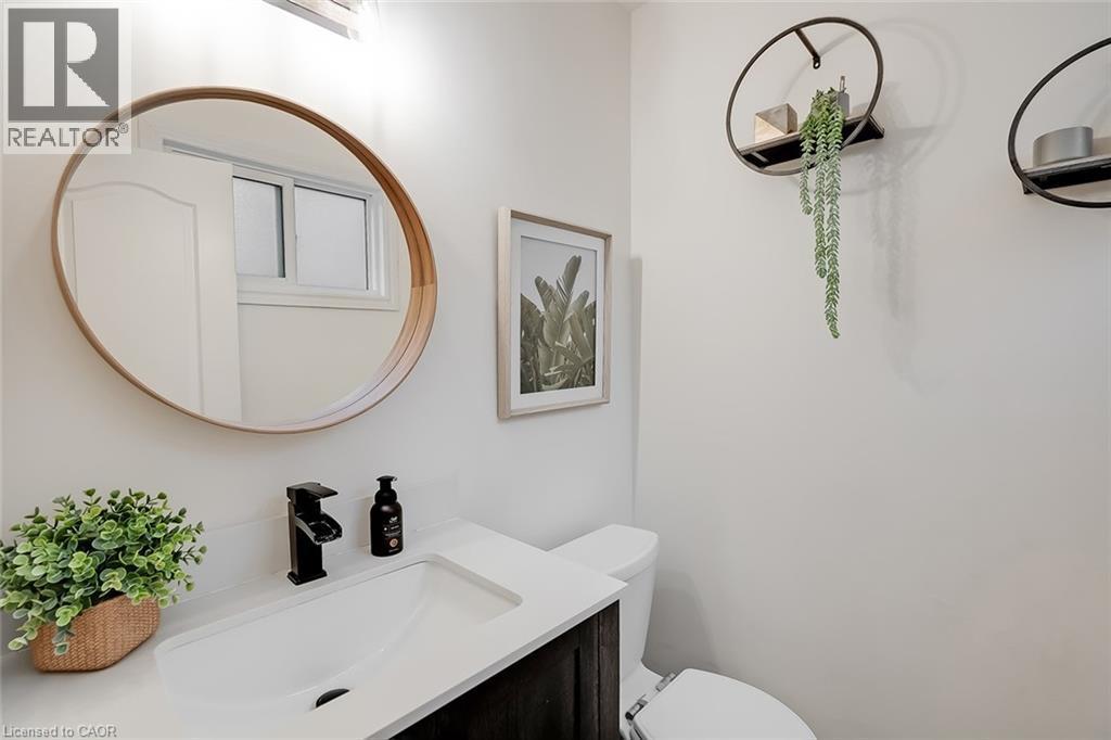 Half bath featuring vanity and toilet - 1278 Consort Crescent, Burlington, ON - Indoor Photo Showing Bathroom