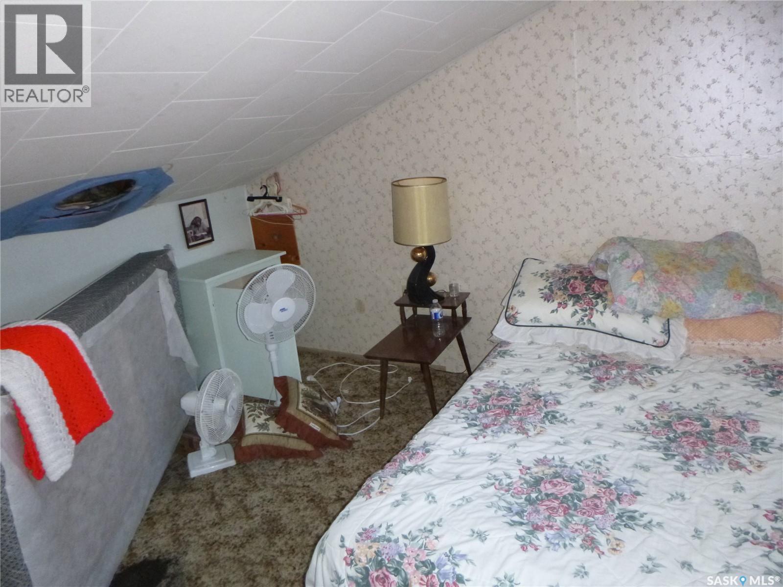 1006 Lake Road, Northern Admin District, SK - Indoor Photo Showing Bedroom