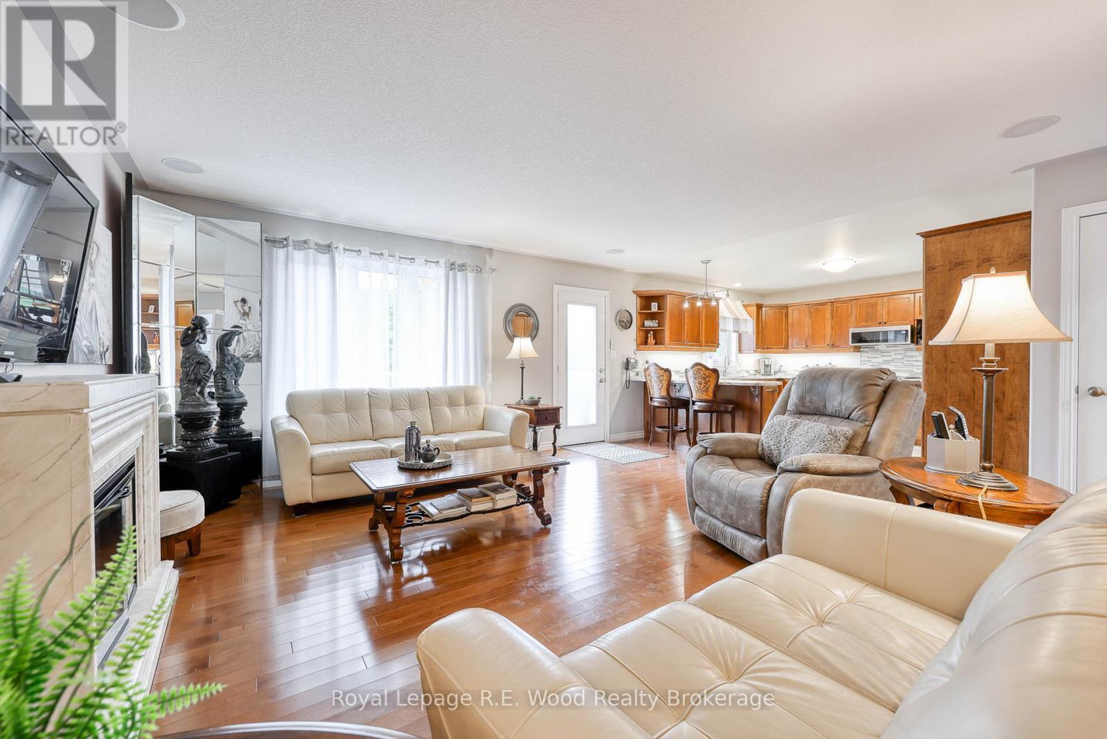 Living Room - 36 Morning Glory Drive, Tillsonburg, ON - Indoor Photo Showing Living Room With Fireplace