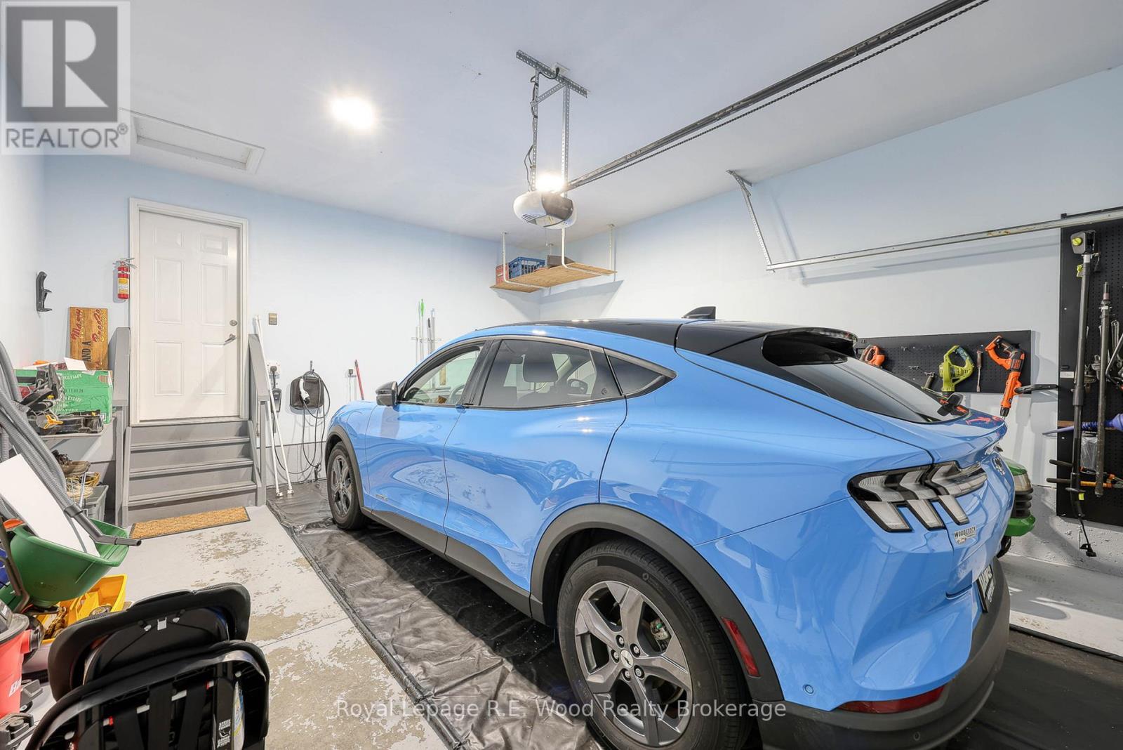 Garage with an EV Charger - 36 Morning Glory Drive, Tillsonburg, ON - Indoor Photo Showing Garage