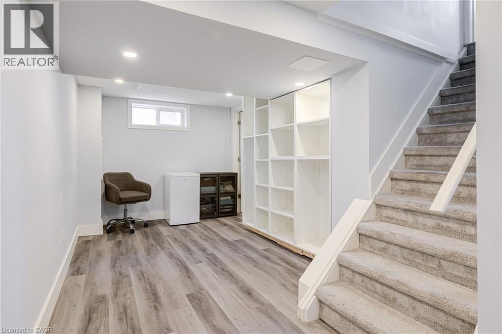 Unfurnished office featuring light wood-type flooring and recessed lighting - 624 Burgess Avenue, Hamilton, ON - Indoor