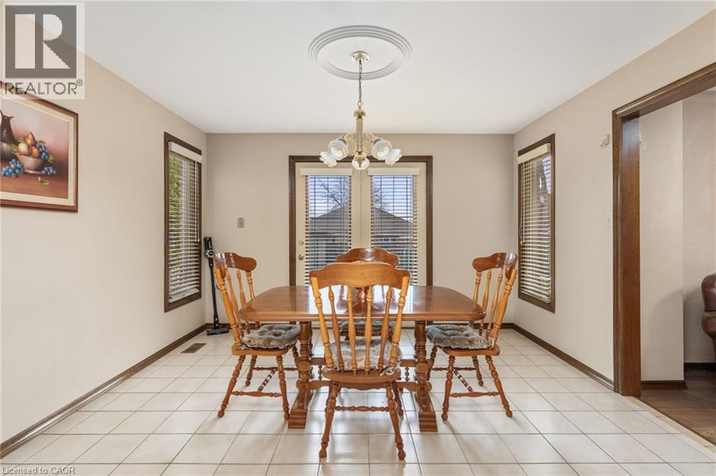 Dining room featuring suspended lighting and baseboards - 57 Derek Drive, Hamilton, ON - Indoor Photo Showing Dining Room