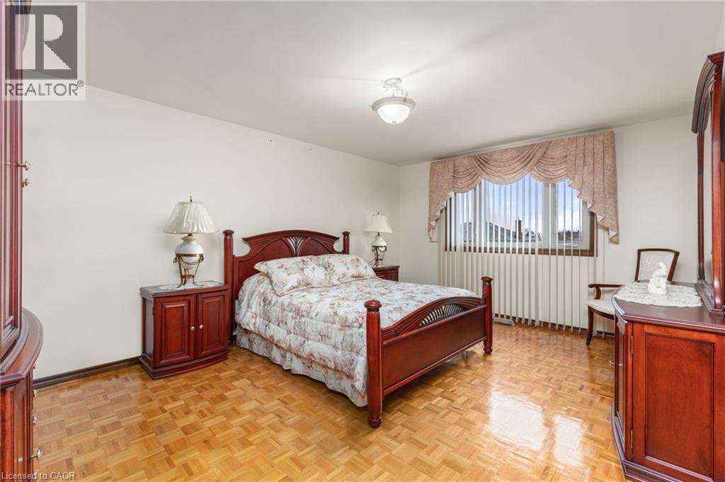 Bedroom featuring parquet floors - 57 Derek Drive, Hamilton, ON - Indoor Photo Showing Bedroom