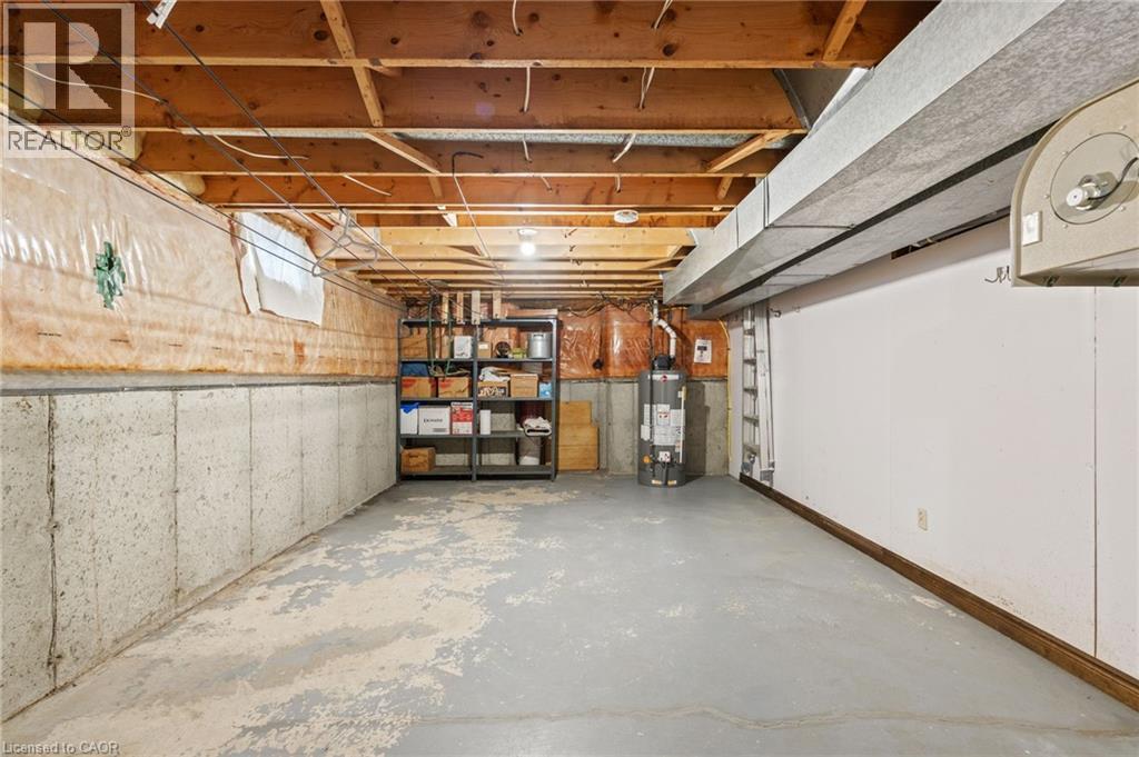 Unfinished basement with gas water heater - 57 Derek Drive, Hamilton, ON - Indoor Photo Showing Basement