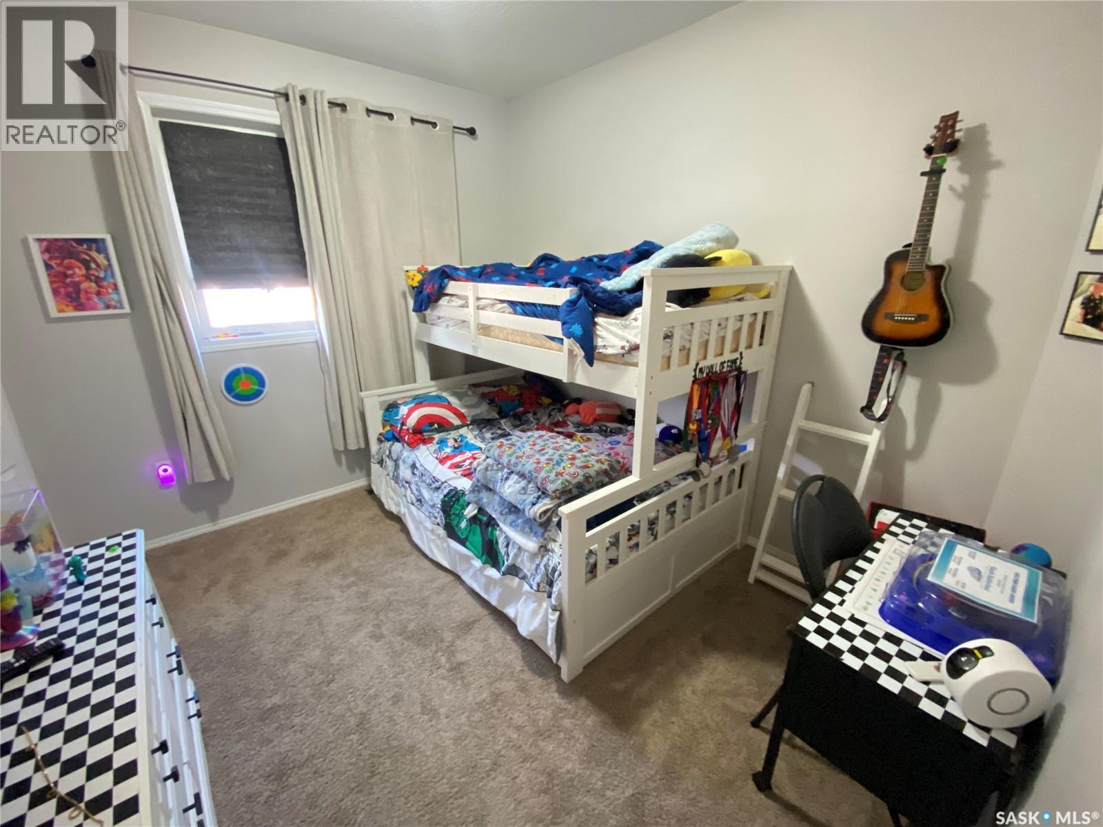 703 Barber Crescent, Weyburn, SK - Indoor Photo Showing Bedroom