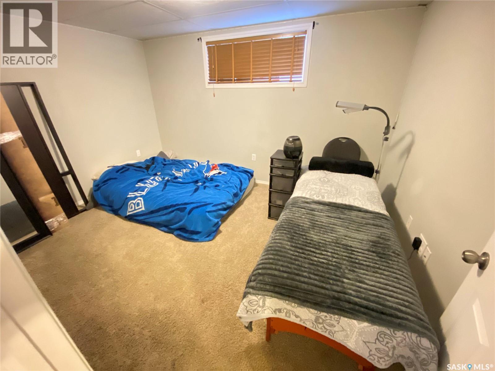 703 Barber Crescent, Weyburn, SK - Indoor Photo Showing Bedroom