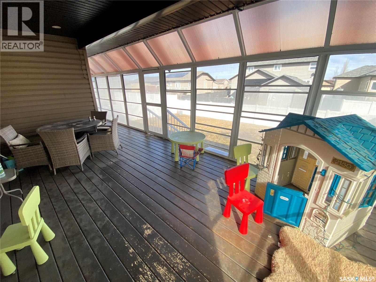 703 Barber Crescent, Weyburn, SK - With Deck Patio Veranda With Exterior