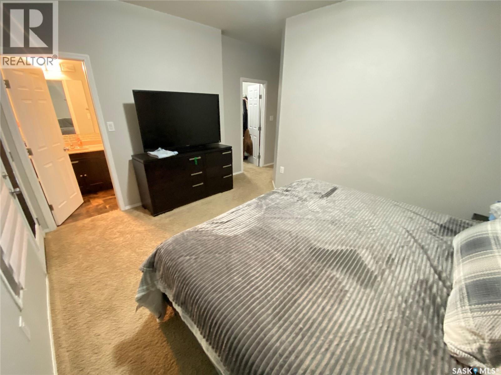 703 Barber Crescent, Weyburn, SK - Indoor Photo Showing Bedroom