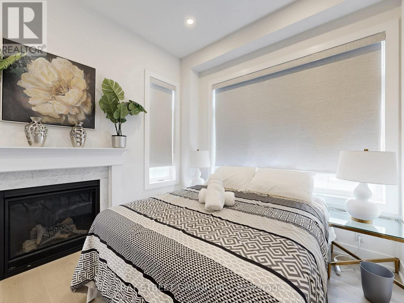 88 Harvey Bunker Crescent, Markham, ON - Indoor Photo Showing Bedroom With Fireplace