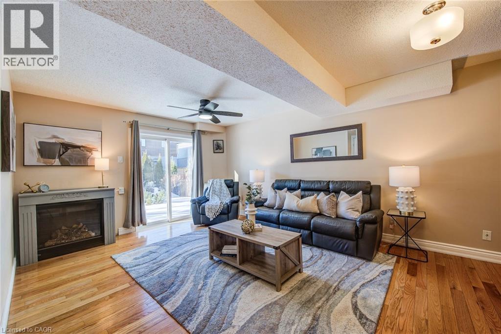 84 Endeavour Drive, Cambridge, ON - Indoor Photo Showing Living Room With Fireplace