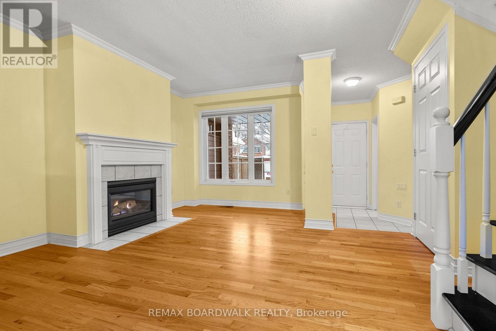 42 College Circle, Ottawa, ON - Indoor Photo Showing Living Room With Fireplace