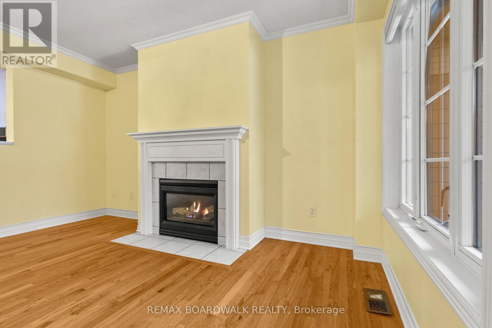 42 College Circle, Ottawa, ON - Indoor Photo Showing Living Room With Fireplace
