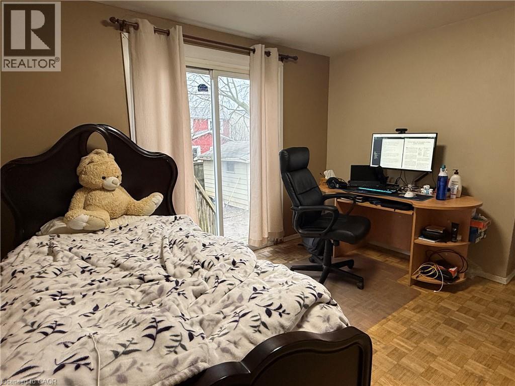Bedroom featuring an office area and parquet floors - 60 Helene Crescent, Waterloo, ON - Indoor Photo Showing Bedroom