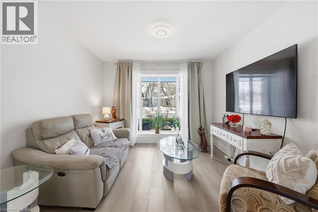 Living area featuring light wood-style flooring - 273 Bryant Crescent, Burlington, ON - Indoor Photo Showing Living Room