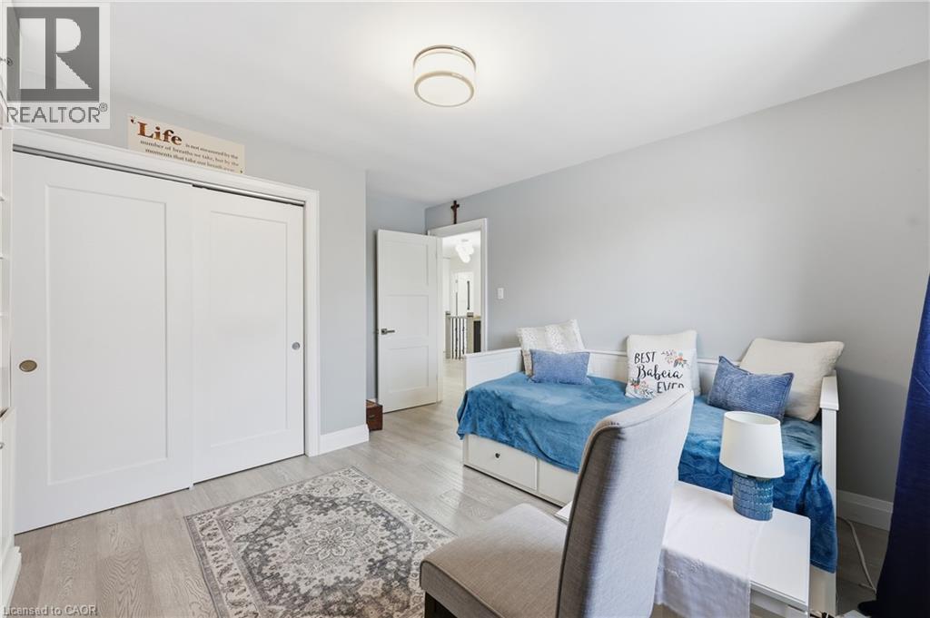 Bedroom with a closet and light wood finished floors - 273 Bryant Crescent, Burlington, ON - Indoor Photo Showing Bedroom