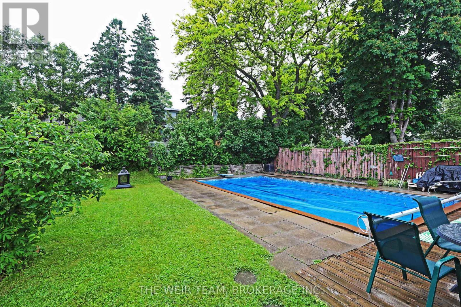 1577 Otterby Road, Mississauga, ON - Outdoor With In Ground Pool