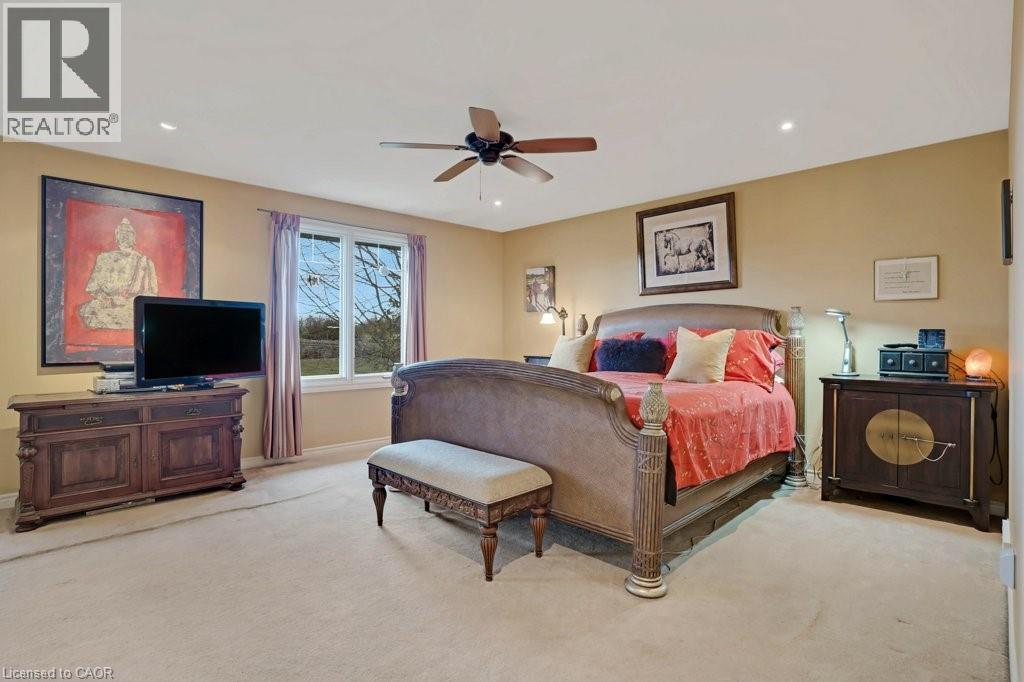 Bedroom with light colored carpet, a ceiling fan, and recessed lighting - 5511 Second Line, Erin, ON - Indoor Photo Showing Bedroom
