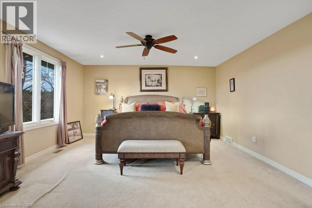 Bedroom featuring light colored carpet, a ceiling fan, and recessed lighting - 5511 Second Line, Erin, ON - Indoor Photo Showing Bedroom
