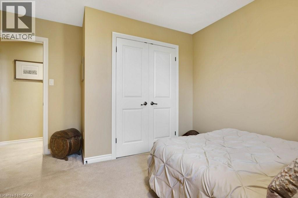 Bedroom with light carpet and a closet - 5511 Second Line, Erin, ON - Indoor Photo Showing Bedroom