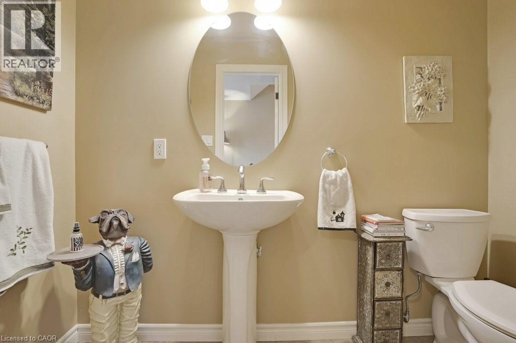 Bathroom featuring toilet and baseboards - 5511 Second Line, Erin, ON - Indoor Photo Showing Bathroom
