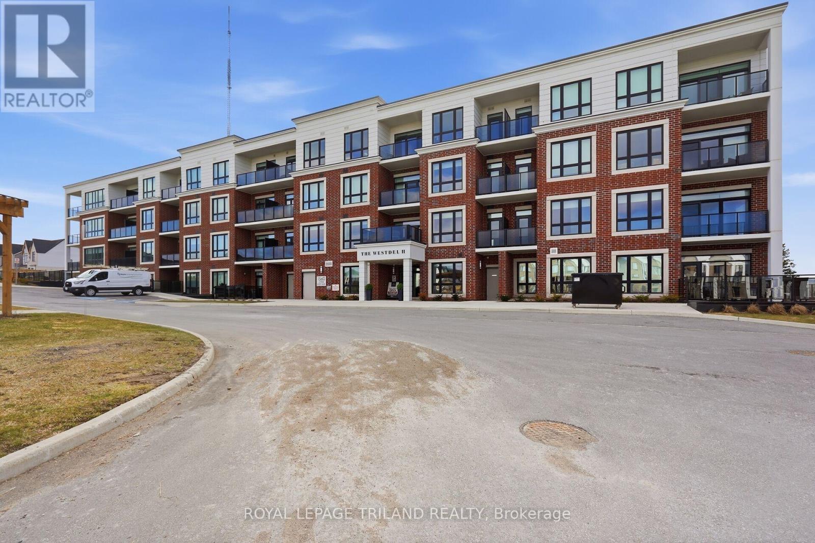 310 - 1560 Upper West Avenue, London South (South B), ON - Outdoor With Balcony With Facade