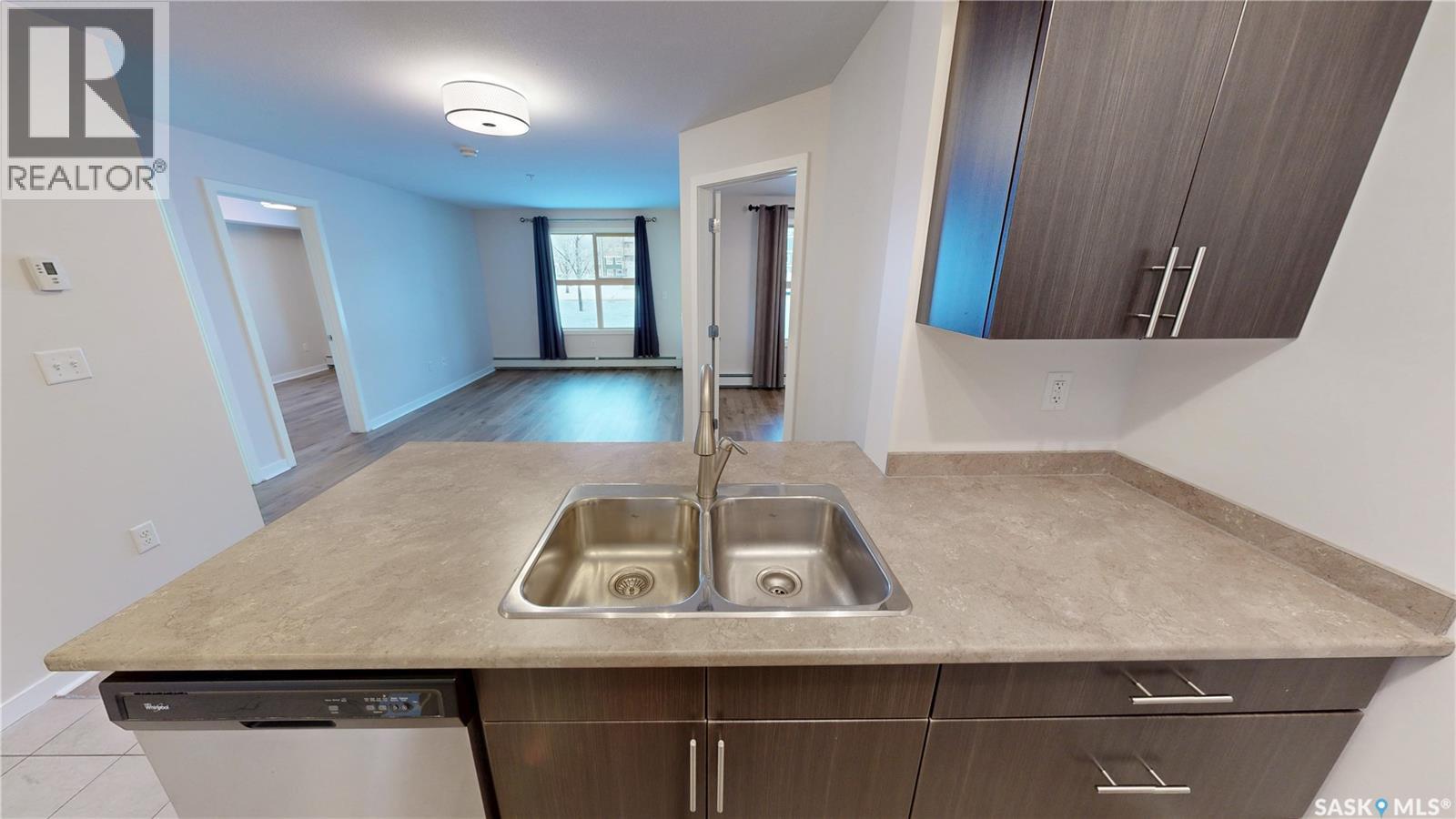 2115 5500 Mitchinson Way, Regina, SK - Indoor Photo Showing Kitchen With Double Sink