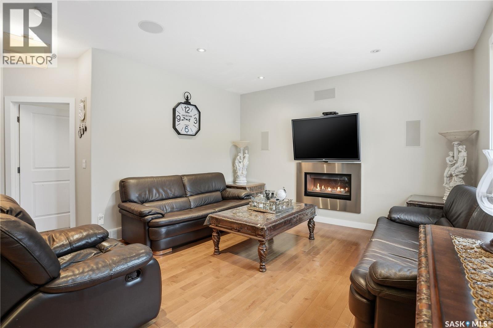 215 Beechwood Crescent, Saskatoon, SK - Indoor Photo Showing Living Room With Fireplace
