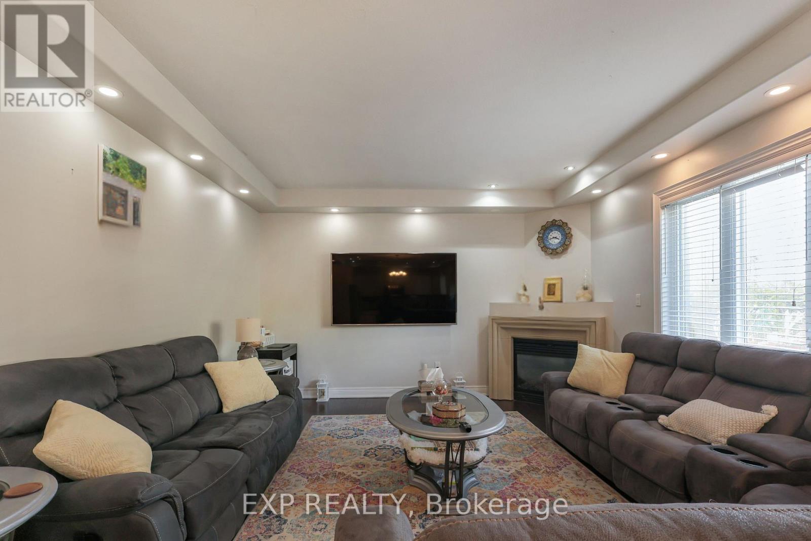 254 Rymal Road W, Hamilton, ON - Indoor Photo Showing Living Room With Fireplace