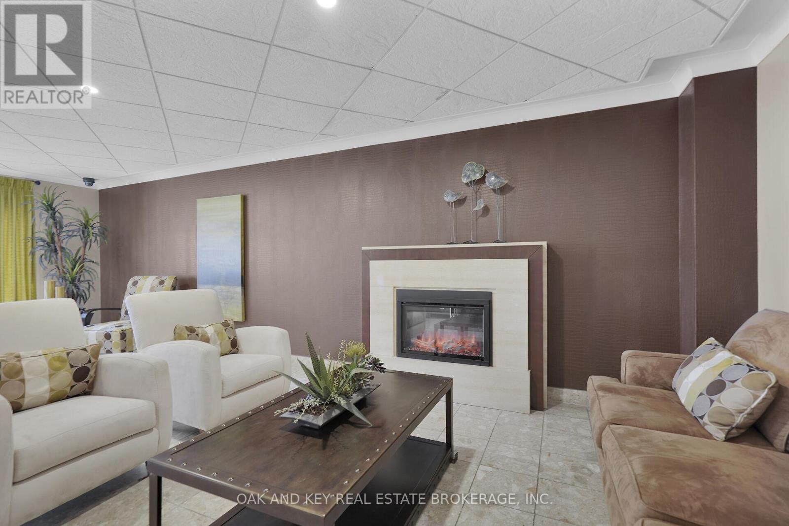 1404 - 500 Talbot Street, London East (East F), ON - Indoor Photo Showing Living Room With Fireplace