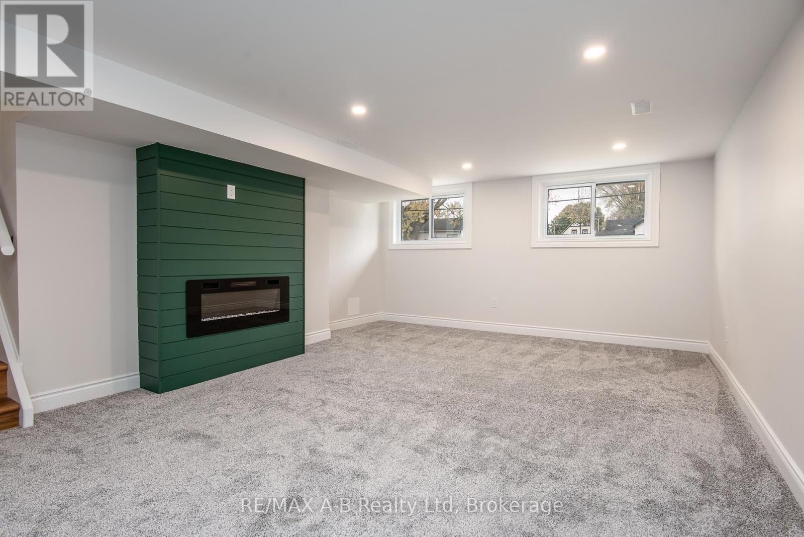 149 Norfolk Street, Stratford, ON - Indoor With Fireplace